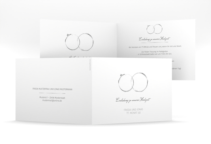 Hochzeitseinladung Trauringe mittlere Klappkarte quer grau minimalistisch gestaltet mit zwei Eheringen