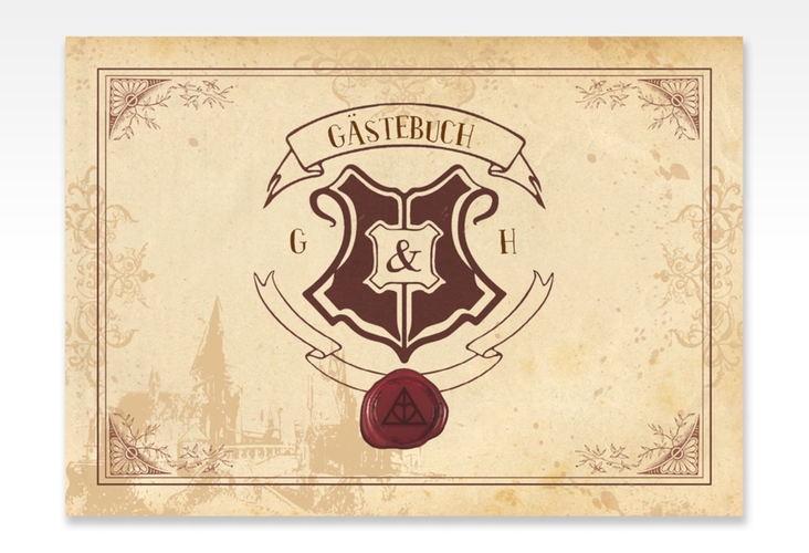 Gästebuch A4 quer Zauberkunst A4 quer, Hardcover beige mit Fantasy-Wappen, Siegel und Zauberschule