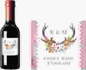 Piccoloetikett Hochzeit Heimatjuwel Etikett Piccolo rosa mit Hirschgeweih und Holz-Hintergrund