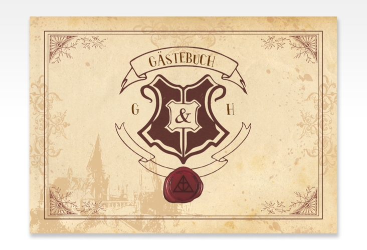 Gästebuch A4 quer Zauberkunst A4 quer, Hardcover beige mit Fantasy-Wappen, Siegel und Zauberschule