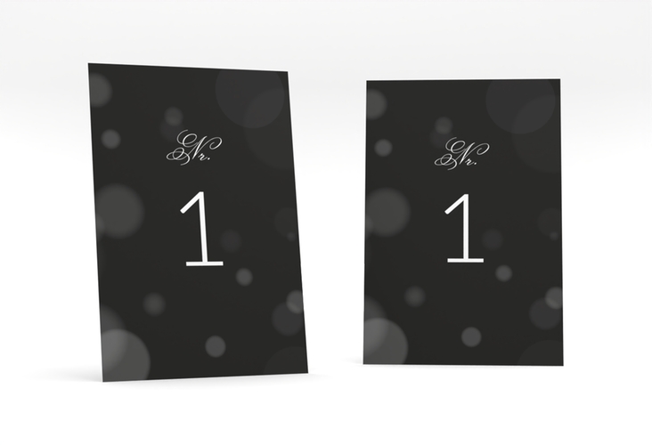 Tischnummer Hochzeit Bokeh Tischaufsteller schwarz