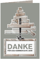 Klick: Details zu Geschäftliche Weihnachtskarte "Hammer" anzeigen Geschäftliche Weihnachtskarte Hammer A6 Klappkarte hoch grau mit Weihnachtbaum aus Brettern und Klauenhammer