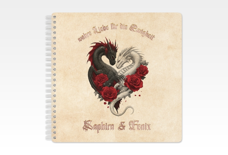 Gästebuch Hochzeit Drachenliebe Ringbindung rosegold mit schwarzem und weißem Drachen zu einem Herz verschlungen