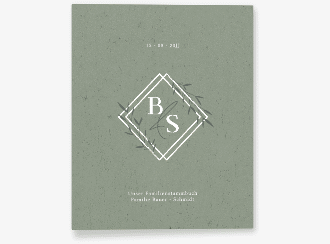Klick: Details zu Stammbuch A4 "Greenletter" anzeigen Stammbuch A4 Greenletter Stammbuch A4 gruen mit Initialen in elegantem Goldrahmen mit Blättern