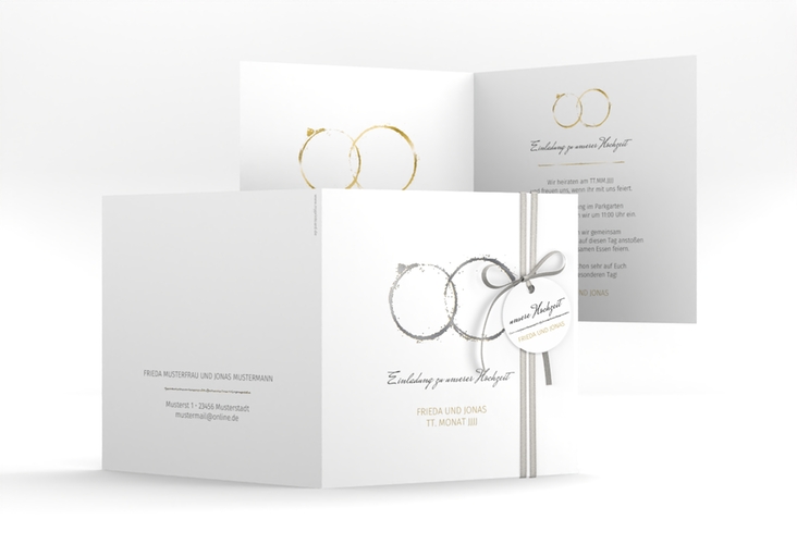 Hochzeitseinladung Trauringe quadr. Klappkarte gold silber minimalistisch gestaltet mit zwei Eheringen