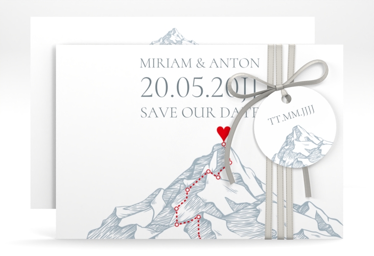 Save the Date-Karte Berge A6 Karte quer blau mit Berggipfel und eingezeichneter Route zum Herzen