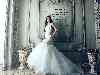 Braut im Meerjungfrauen-Hochzeitskleid