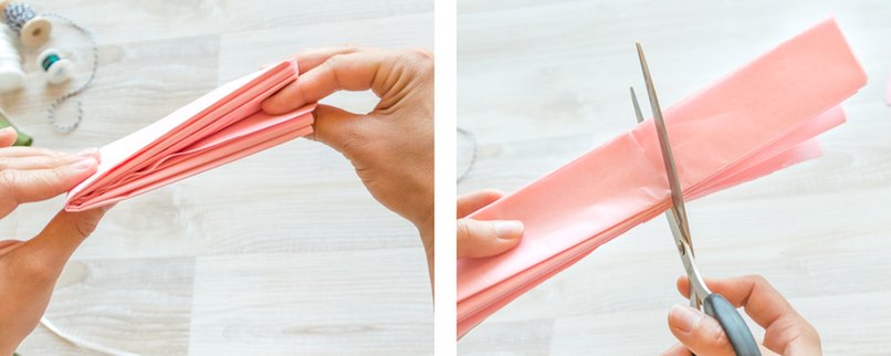 Schritt 2: Das gefaltete Papier in der Mitte falten und leicht einschneiden Gefaltetes Papier einschneiden