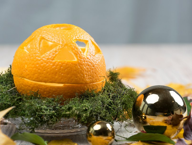 Orangenkerze mit Deckel