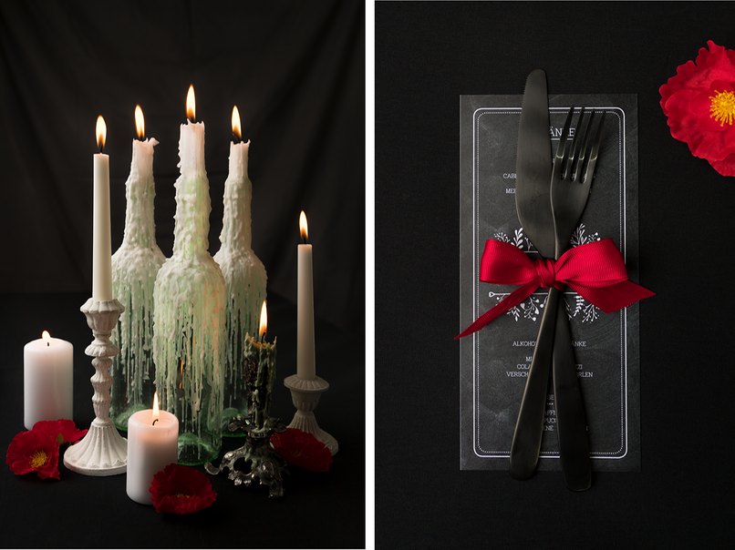 Schwarzes Besteck und arrangierte Kerzen für die Halloween-Tischdeko