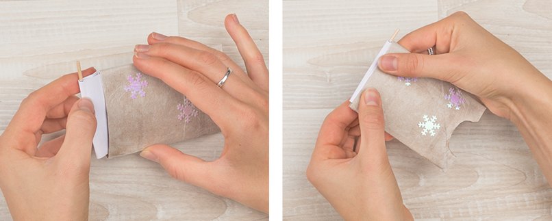 Bastelschritt 6 - Papier um Schaschlikspieß umknicken und an den Aussenseiten Kleber auftragen. Dann in die Klorolle kleben